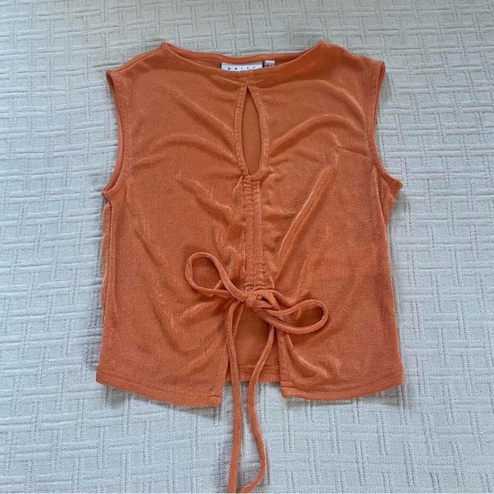ASOS orange crop top with keyhole cut out & ribbon bow tie.